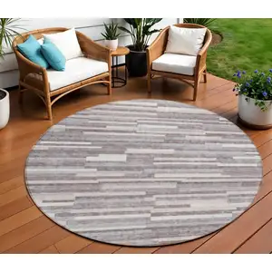 Photo of 8' Lavender Gray And Ivory Round Striped Washable Indoor Outdoor Area Rug