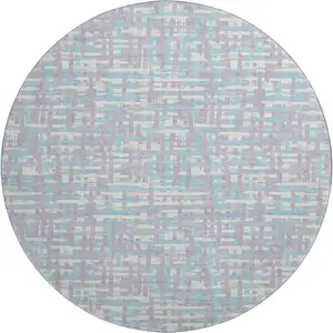 Photo of 8' Lavender Ivory And Aqua Abstract Geometric Washable Round Rug With UV Protection