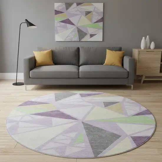 8' Lavender Lime Green And Ivory Geometric Washable Round Rug With UV Protection Photo 1