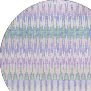 Photo of 8' Lavender Pink And Lime Green Round Southwestern Washable Indoor Outdoor Area Rug