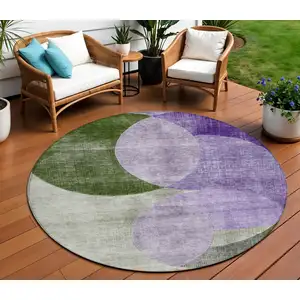 Photo of 8' Lavender Purple And Green Round Geometric Washable Indoor Outdoor Area Rug