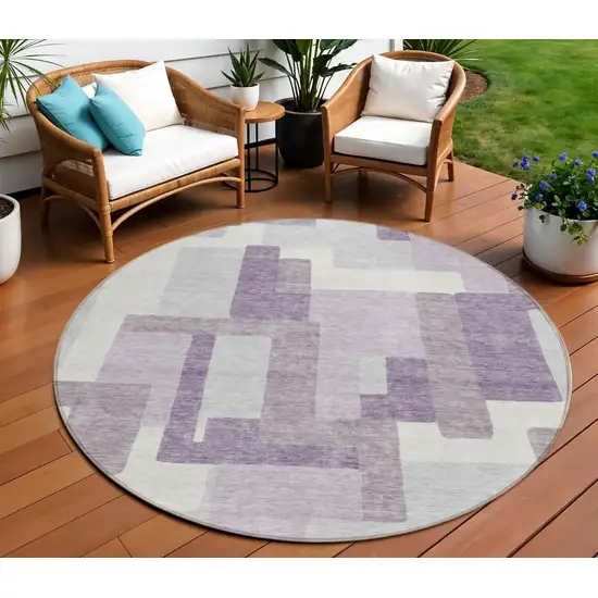 8' Lavender Purple And Ivory Round Abstract Washable Indoor Outdoor Area Rug Photo 1