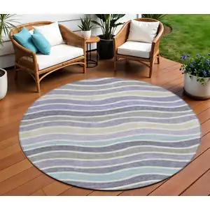 Photo of 8' Lavender Tan And Ivory Round Striped Washable Indoor Outdoor Area Rug