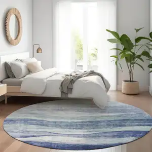 Photo of 8' Light Blue And Dark Blue Round Abstract Washable Indoor Outdoor Area Rug