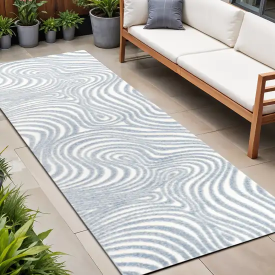 10' Light Blue And Ivory Abstract Indoor Outdoor Runner Rug Photo 1