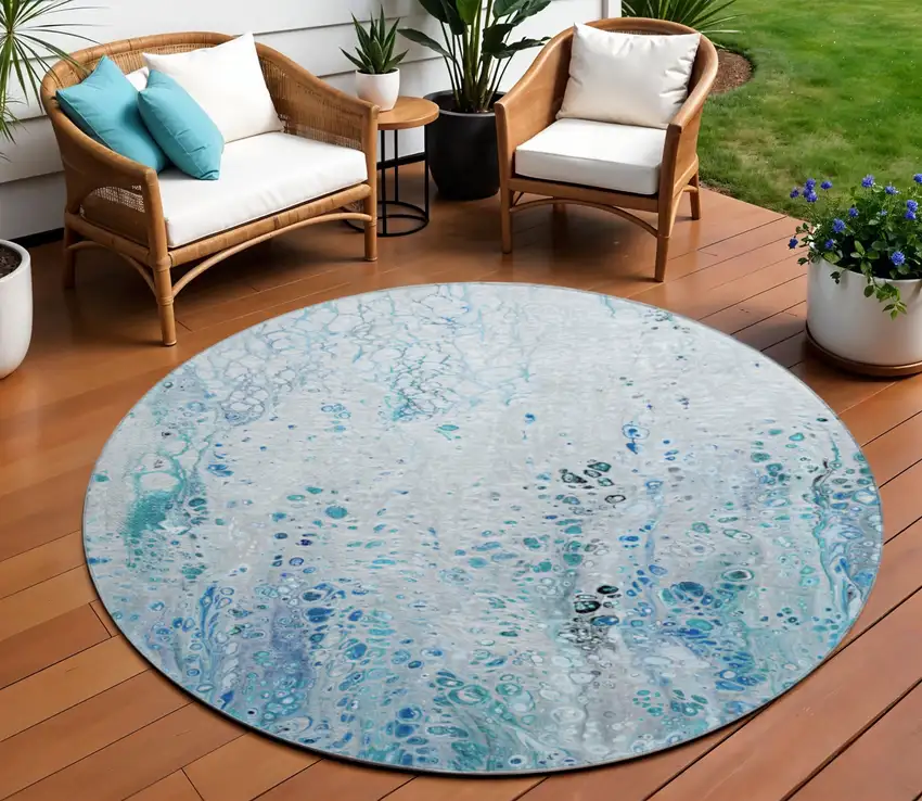 8' Light Blue And Ivory Round Abstract Washable Indoor Outdoor Area Rug Photo 1