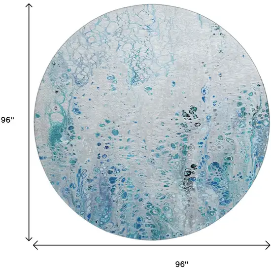 8' Light Blue And Ivory Round Abstract Washable Indoor Outdoor Area Rug Photo 3