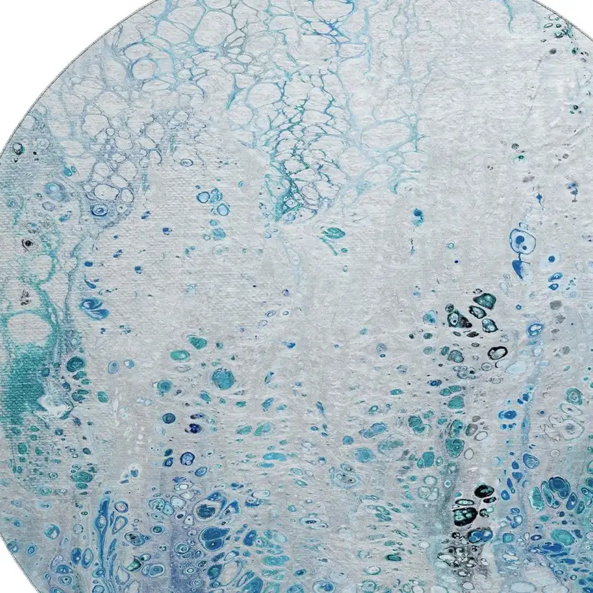 8' Light Blue And Ivory Round Abstract Washable Indoor Outdoor Area Rug Photo 5