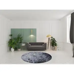 Photo of 8' Light Blue Black And Gray Abstract Round Rug