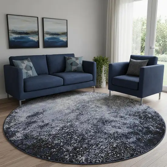 8' Light Blue Black And Gray Abstract Round Rug Photo 1