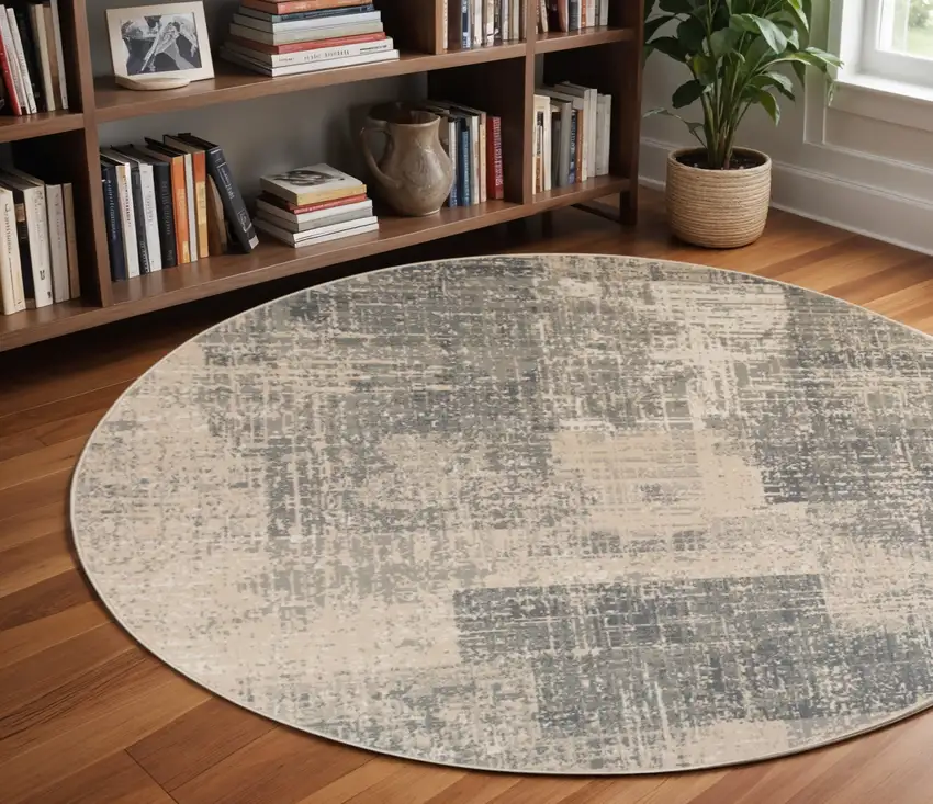 8' Gray and Light Blue Abstract Power Loom Round Rug Photo 1