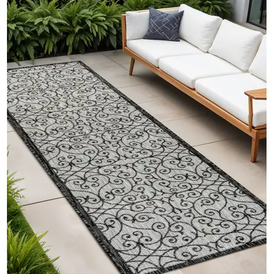 10' Light Gray And Black Geometric Indoor Outdoor Runner Rug Photo 1