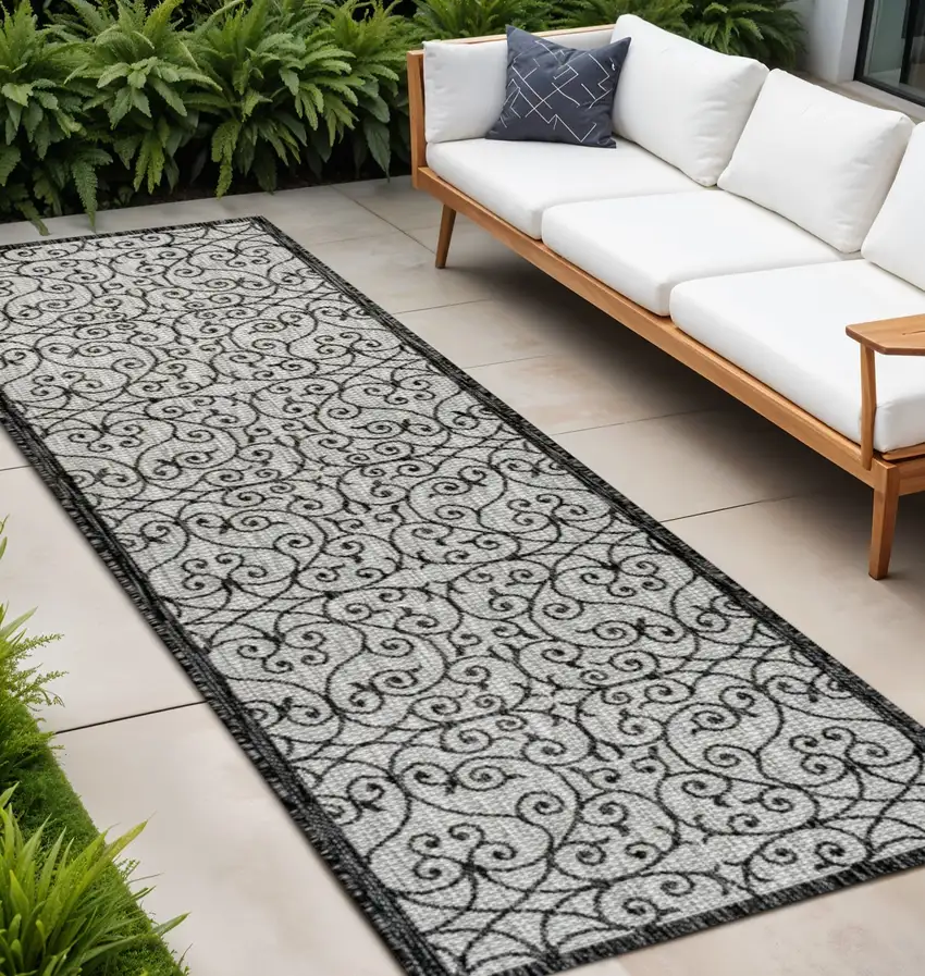 10' Light Gray And Black Geometric Indoor Outdoor Runner Rug Photo 1