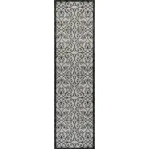 Photo of 8' Light Gray And Black Geometric Indoor Outdoor Runner Rug