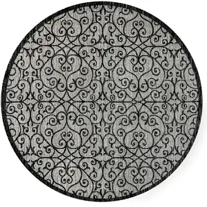 Photo of 8' Light Gray And Black Round Geometric Indoor Outdoor Area Rug