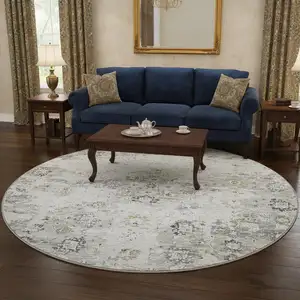 Photo of 8' Light Gray And Charcoal Floral Medallion Washable Round Rug With UV Protection