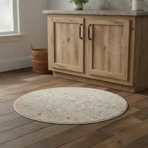 Photo of 4' Light Gray Black And Yellow Floral Distressed Round Rug