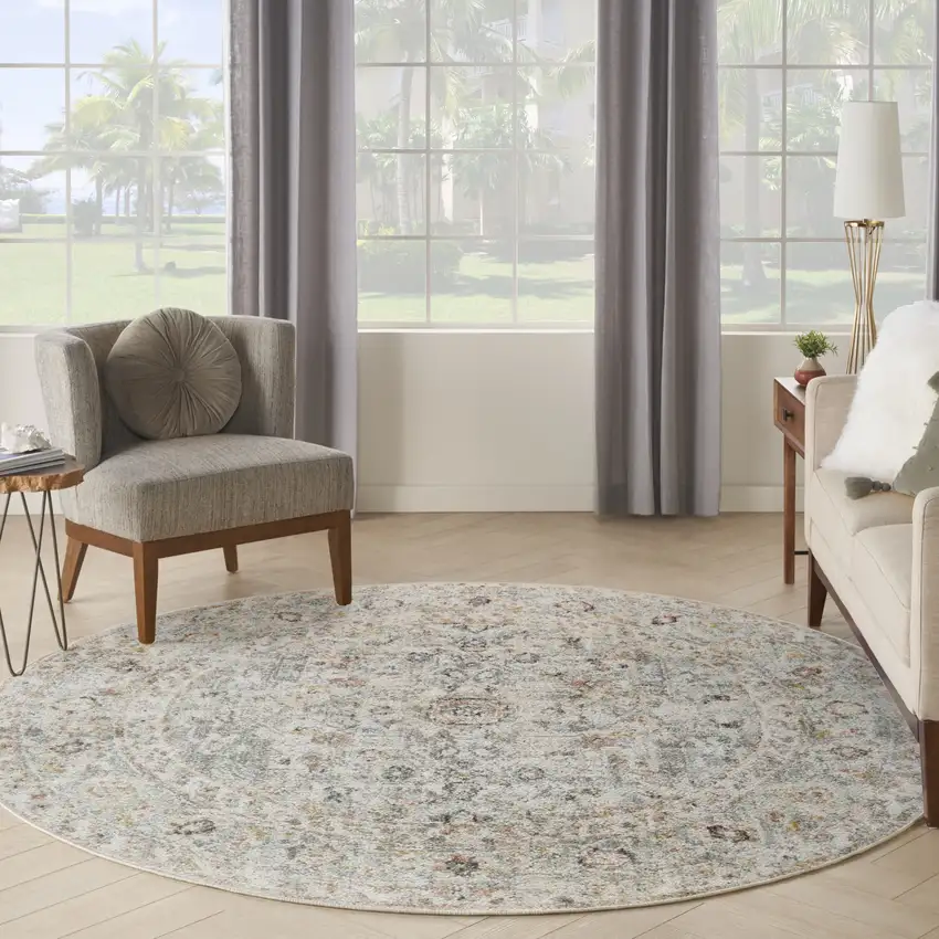 8' Light Gray Black And Yellow Floral Distressed Round Rug Photo 6