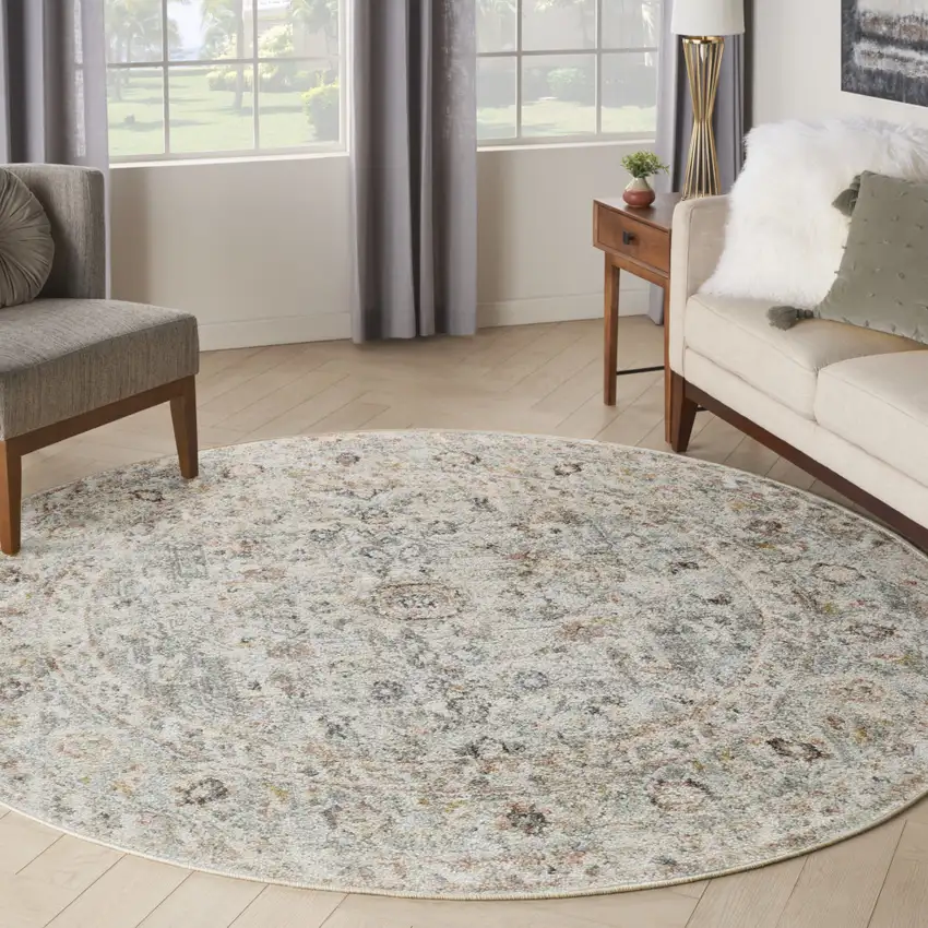 8' Light Gray Black And Yellow Floral Distressed Round Rug Photo 4