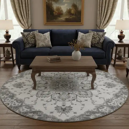 8' Light Gray Ivory And Gold Floral Medallion Washable Round Rug With UV Protection Photo 1