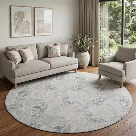 8' Light Gray Taupe And Charcoal Tropical Botanical Distressed Washable Round Rug With UV Protection Photo 1
