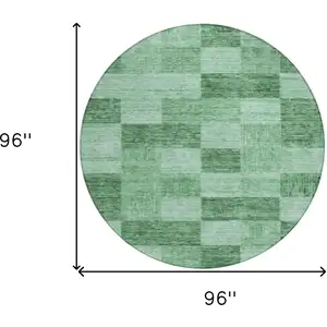 Photo of 8' Light Green And Dark Green Round Geometric Washable Indoor Outdoor Area Rug