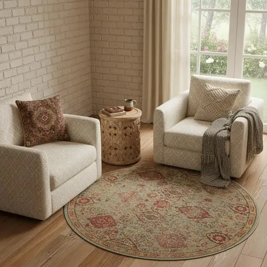 6' Light Green Tan And Red Floral Distressed Non Skid Round Rug Photo 1