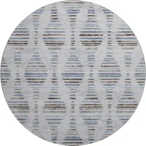 Photo of 8' Light Taupe And Blue Striped Washable Round Rug With UV Protection
