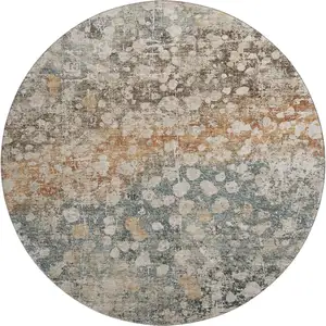 Photo of 8' Light Taupe And Brown Abstract Washable Round Rug With UV Protection