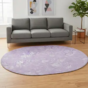 Photo of 8' Lilac And Ivory Floral Washable Round Rug With UV Protection
