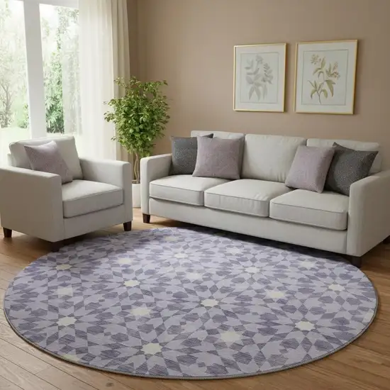 8' Lilac And Ivory Geometric Washable Round Rug With UV Protection Photo 1
