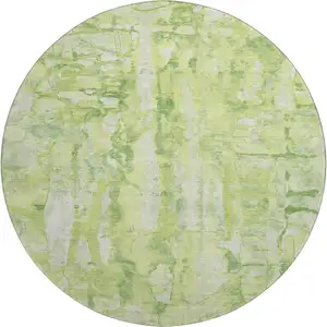 Photo of 8' Lime Green And Ivory Abstract Washable Round Rug With UV Protection