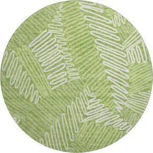 Photo of 8' Lime Green And Ivory Floral Washable Round Rug With UV Protection