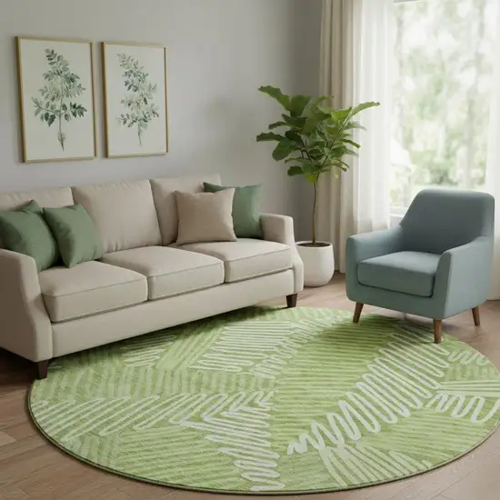 8' Lime Green And Ivory Floral Washable Round Rug With UV Protection Photo 1