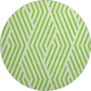 Photo of 8' Lime Green And Ivory Geometric Washable Round Rug With UV Protection
