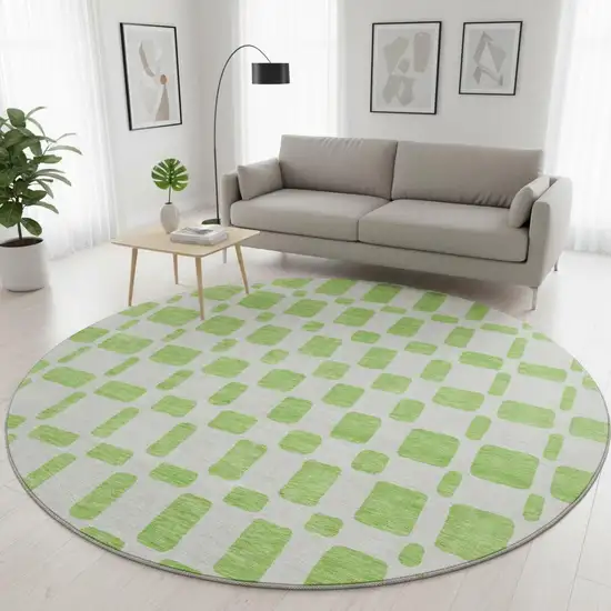 8' Lime Green And Ivory Geometric Washable Round Rug With UV Protection Photo 2