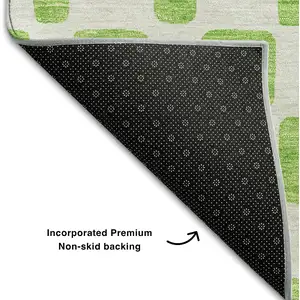 Photo of 8' Lime Green And Ivory Geometric Washable Round Rug With UV Protection