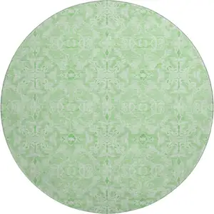 Photo of 8' Lime Green And Ivory Medallion Washable Round Rug With UV Protection
