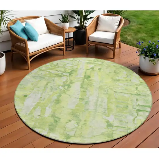 8' Lime Green And Ivory Round Abstract Washable Indoor Outdoor Area Rug Photo 1
