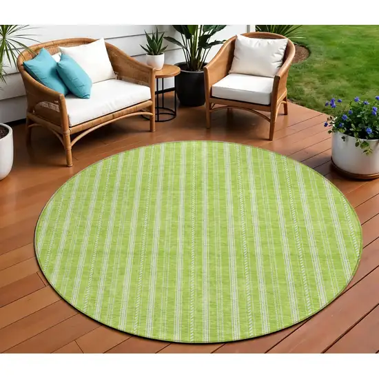 8' Lime Green And Ivory Round Striped Washable Indoor Outdoor Area Rug Photo 1