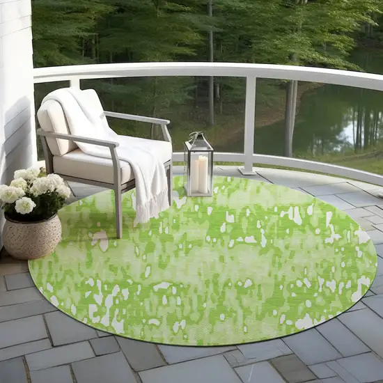 8' Lime Green And Ivory Round Striped Washable Indoor Outdoor Area Rug Photo 6