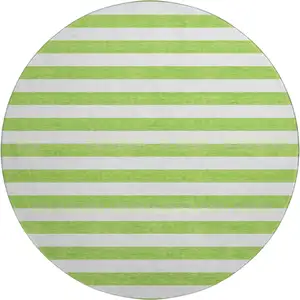 Photo of 8' Lime Green And Ivory Striped Washable Round Rug With UV Protection
