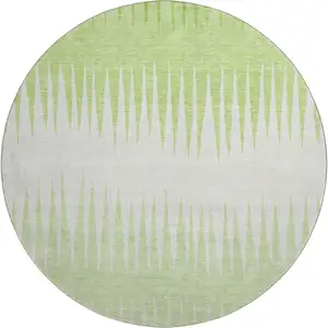 Photo of 8' Lime Green And Ivory Striped Washable Round Rug With UV Protection