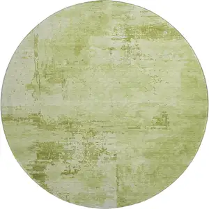 Photo of 8' Lime Green And Olive Green Abstract Washable Round Rug With UV Protection