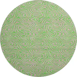 Photo of 8' Lime Green And Pink Abstract Washable Round Rug With UV Protection
