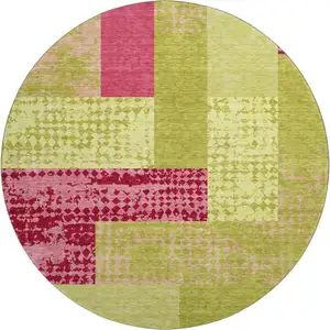 Photo of 8' Lime Green And Pink Geometric Washable Round Rug With UV Protection