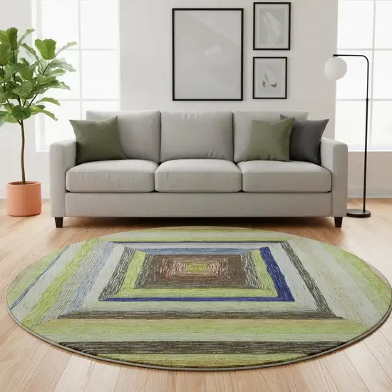 8' Lime Green Blue And Brown Geometric Washable Round Rug With UV Protection Photo 2