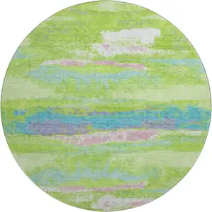 Photo of 8' Lime Green Blue And Pink Abstract Washable Round Rug With UV Protection