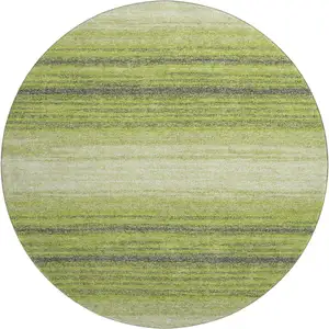 Photo of 8' Lime Green Gray And Ivory Striped Washable Round Rug With UV Protection