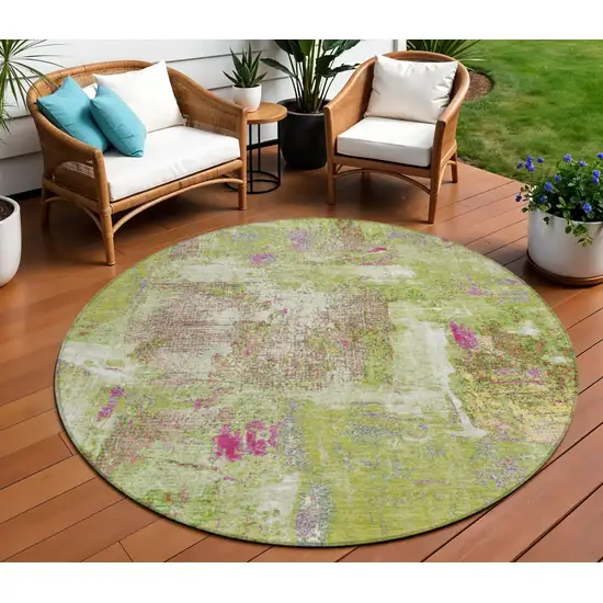 8' Lime Green Ivory And Pink Round Abstract Washable Indoor Outdoor Area Rug Photo 1